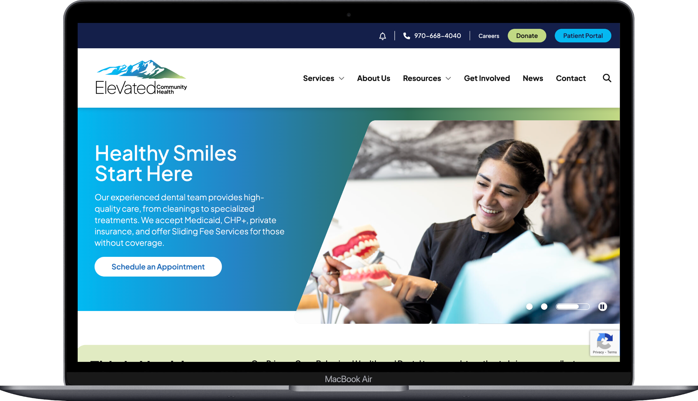Elevated Community Health responsive homepage shown on a laptop